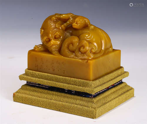 A CHINESE SOAPSTONE FOO-DOG SEAL