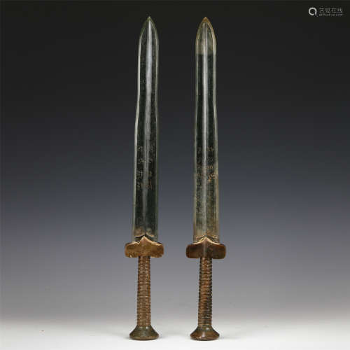 A PAIR OF CHINESE JASPER SWORDS
