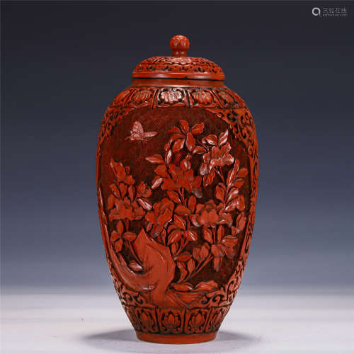 A CHINESE TIXI LACQUER VASE WITH COVER
