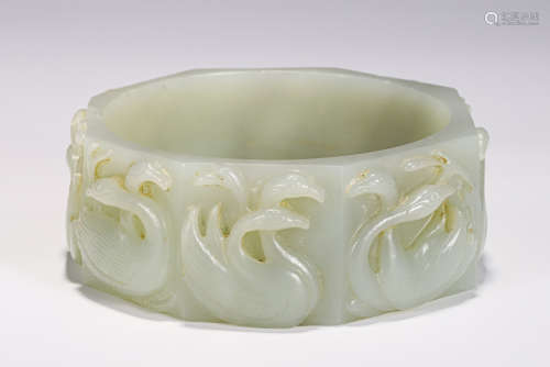 A CHINESE CARVED JADE ARMBROCELETS