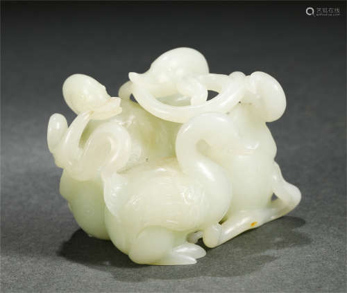 A CHINESE JADE FOO-DOG DECORATION