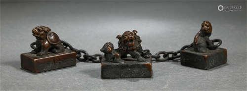 A SET OF CHINESE BRONZE FOO-DOG SEALS