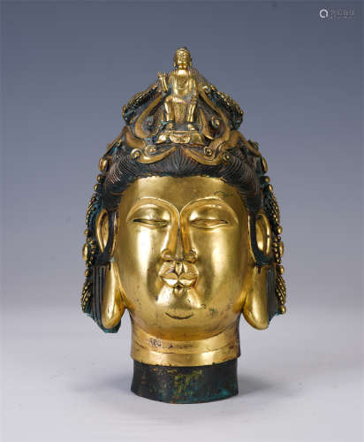 A CHINESE GILT BRONZE BUDDHA HEAD