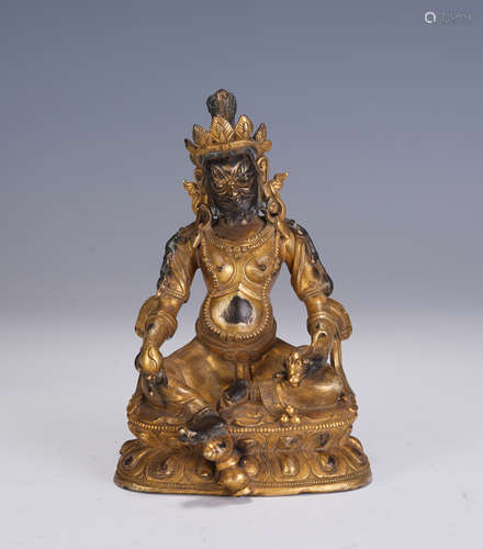 A CHINESE GILT BRONZE FIGURE OF BUDDHA SEATED STATUE