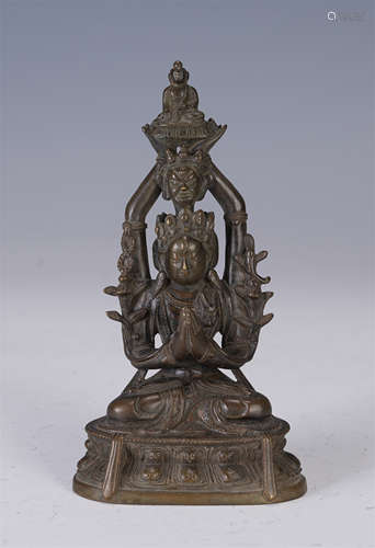 A CHINESE FIGURE OF BUDDHA SEATED STATUE