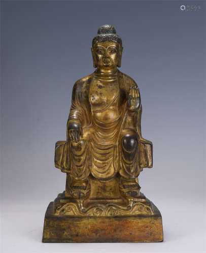 A CHINESE GILT BRONZE FIGURE OF BUDDHA SEATED STATUE