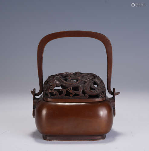 A CHINESE BRONZE CENSER WITH HANDLE