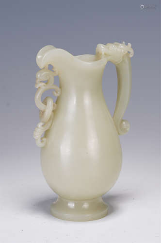 A CHINESE WHITE JADE HANDLED EWER