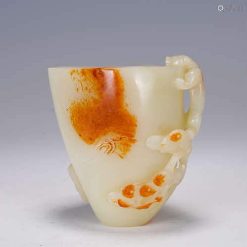 A CHINESE WHITE JADE QIAOSE CUP