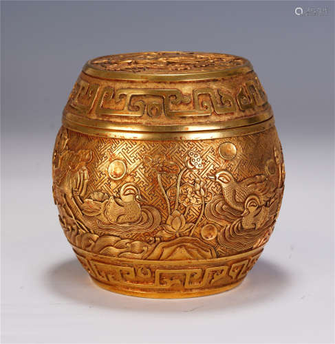 A CHINESE GILT BRONZE DRUM STOOL