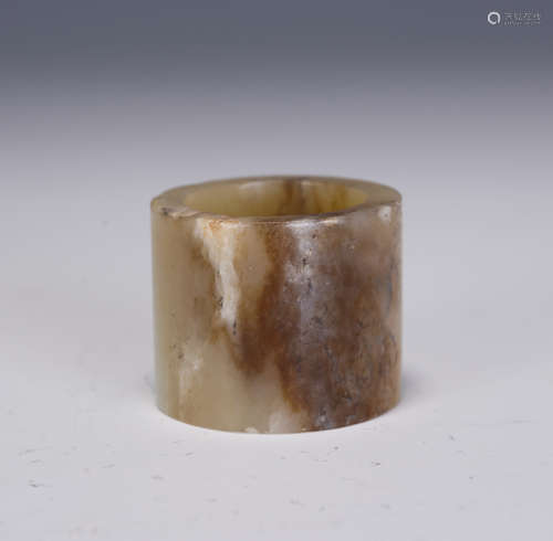 A CHINESE JADE ARCHER'S RING