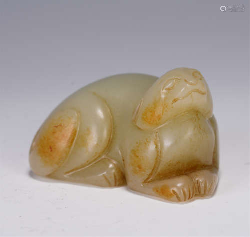 A CHINESE WHITE JADE FOO-DOG PAPER WEIGHT