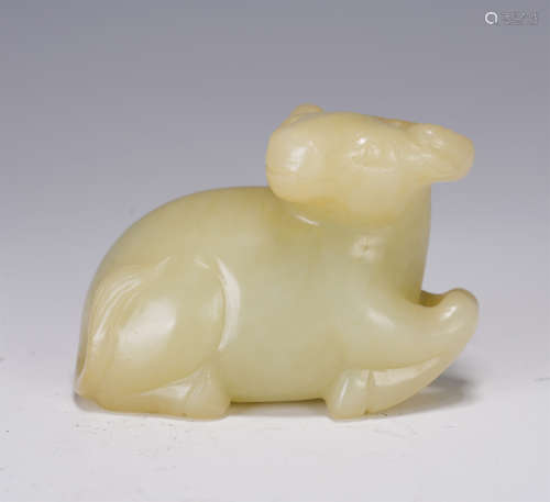 A CHINESE JADE FOO-DOG PAPER WEIGHT