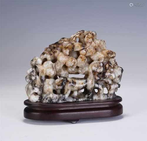 A CHINESE CARVED HARDJADE DECORATIONS