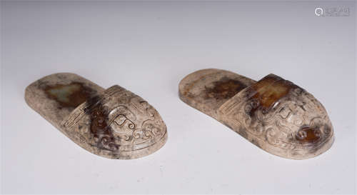 A PAIR OF CHINESE JADE SHOES