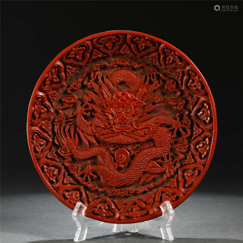 A CHINESE TIXI LACQUER DRAGON PATTERN PLATE
