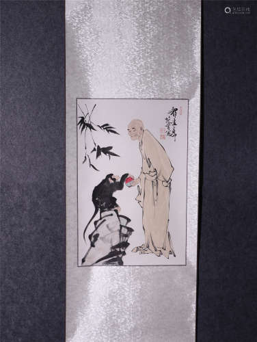 A CHINESE PAINTING OF FIGURE AND MONKEY