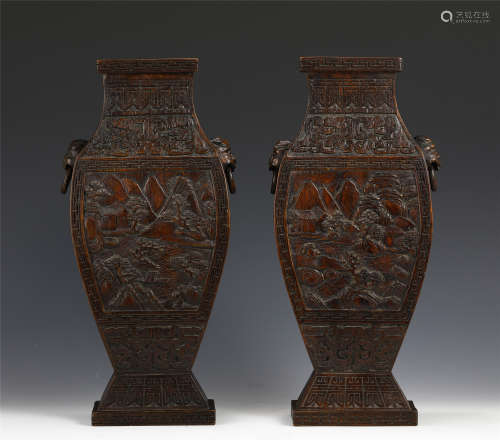 A PAIR OF CHINESE CARVED AGARWOOD VASES