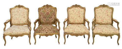 Suite of Four Louis XV Style Carved Open Armchairs