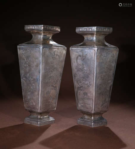 PAIR OF SILVER CAST FLORAL PATTERN VASES