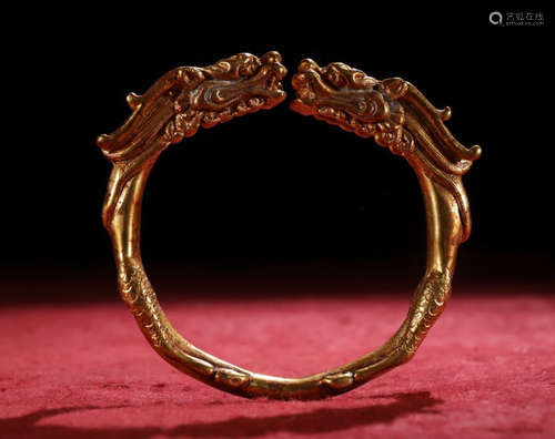 GILT BRONZE CAST DRAGON PATTERN BANGLE