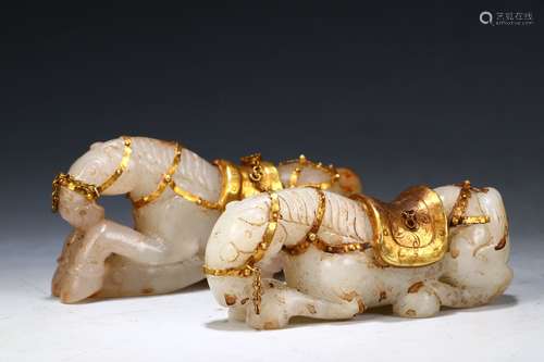 Old Collection. A Pair of Gilt Hetian Jade Horse Ornaments