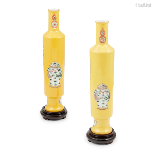 TWO YELLOW GROUND FAMILLE ROSE 'ANTIQUITY' TALL VASES