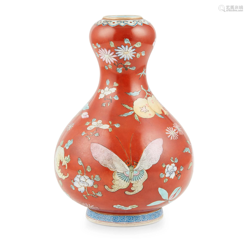 RED-GROUND FAMILLE ROSE GOURD-SHAPED VASE QIANLONG …