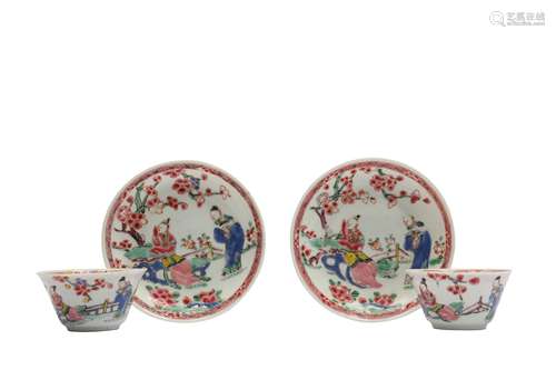 A PAIR OF CHINESE FAMILLE ROSE 'LOVERS' CUPS AND SAUCERS.