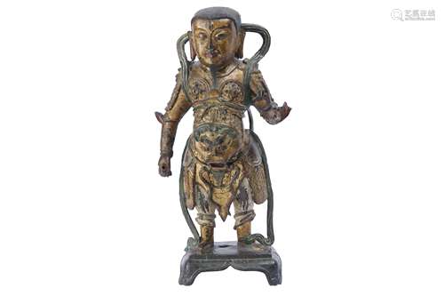 A CHINESE GILT-BRONZE FIGURE OF ZHENWU.