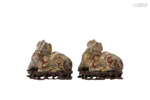 A PAIR OF CHINESE CLOISONNÉ ENAMEL AND GILT BRONZE ‘RAM’ PAP...