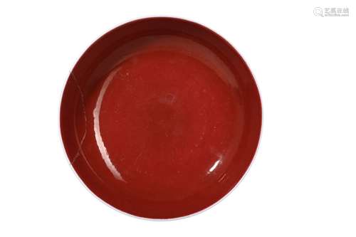 A CHINESE COPPER RED GLAZED DISH.