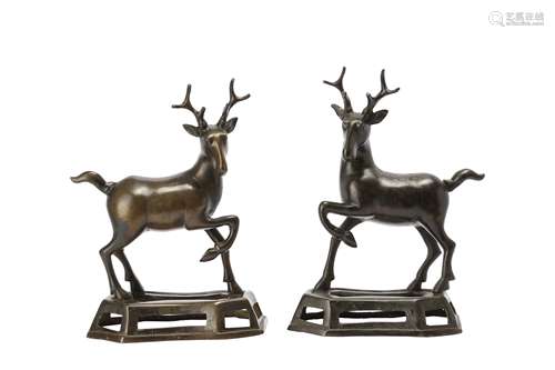 A PAIR OF CHINESE BRONZE DEER.