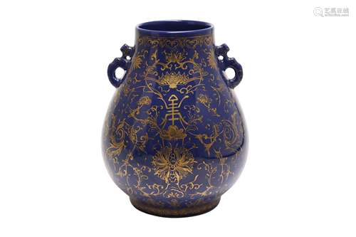 A CHINESE GILT-DECORATED BLUE-GROUND VASE, HU.