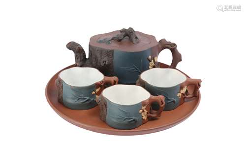 A CHINESE YIXING ZISHA 'THREE FRIENDS OF WINTER' TEASET.