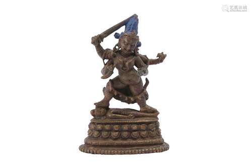 A TIBETAN BRONZE FIGURE OF A DAKINI.