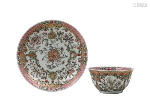 A CHINESE FAMILLE ROSE CUP AND SAUCER.