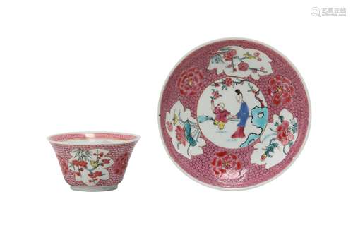 A CHINESE FAMILLE ROSE 'LADY AND BOY' CUP AND SAUCER.