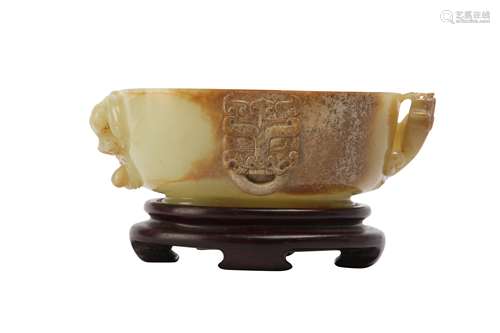 A CHINESE YELLOW JADE WASHER.