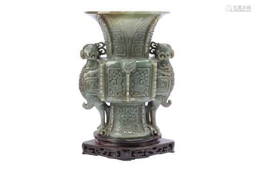 A LARGE CHINESE CELADON JADE ARCHAISTIC 'PHOENIX' VASE, GU.