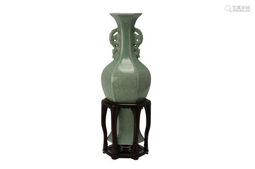 A CHINESE CELADON-GLAZED ‘DOUBLE FISH’ VASE.