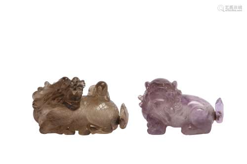 TWO CHINESE HARDSTONE 'MYTHICAL BEASTS' SNUFF BOTTLES.