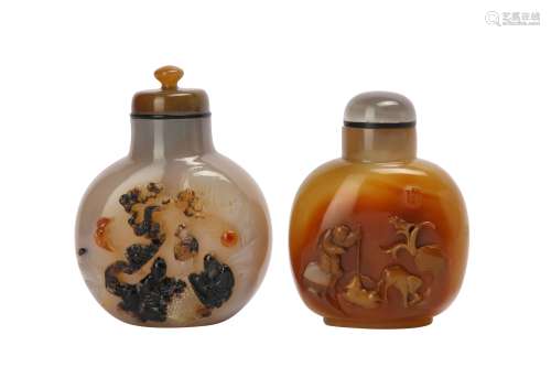 TWO CHINESE AGATE SNUFF BOTTLES.