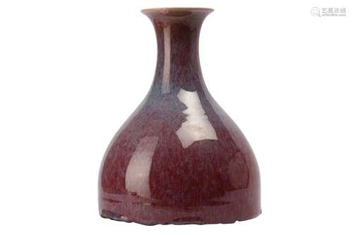 A CHINESE FLAMBE-GLAZED VASE.