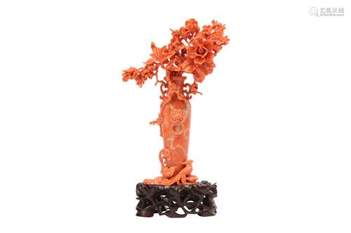 A CHINESE CORAL 'VASE' CARVING.