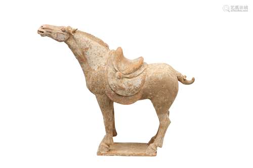 A CHINESE POTTERY MODEL OF A HORSE.