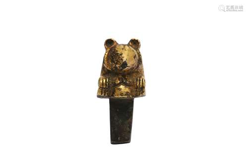 A CHINESE GILT-BRONZE BEAR FINIAL.