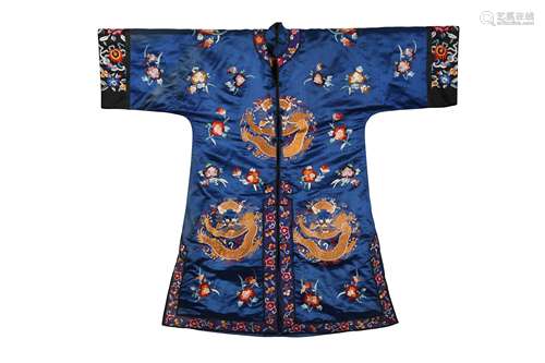 A CHINESE BLUE-GROUND SILK 'DRAGON' JACKET.