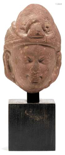 A SMALL HEAD OF A BODHISATTVA.