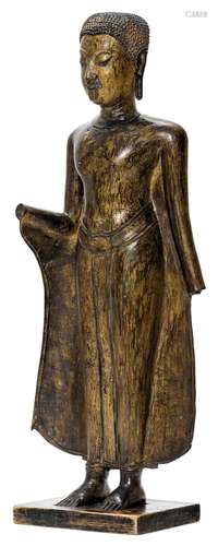 A BRONZE FIGURE OF THE STANDING BUDDHA.